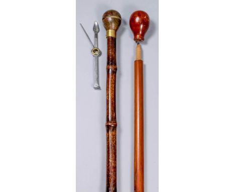 An early 20th Century novelty walking cane, the shaft impressed and lettered in gold "J. T. Burton", the knopped top removing