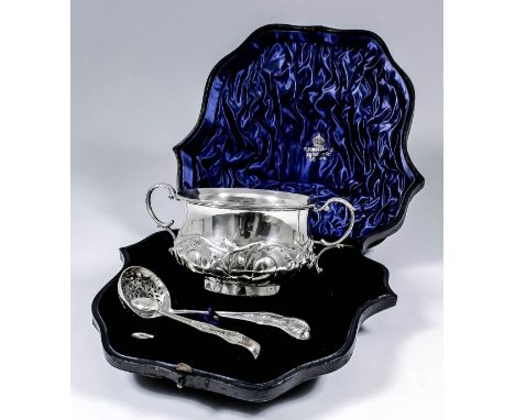 An Edward VII silver two-handled sugar basin embossed with trailing leaf and spiral reeded ornament, with double C-scroll han