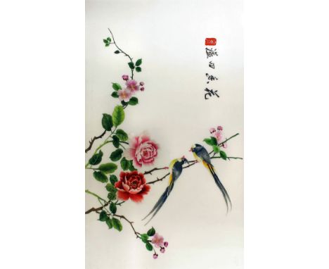 A Chinese silk embroidered panel with birds on flowering branches, 13.5ins (34.3cm) x 22.75ins (57.8cm), with seal mark and s