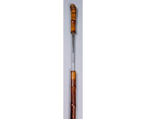 A 19th Century German composite walking cane sword stick with bamboo shaft, the 26ins square section steel blade marked "Coul