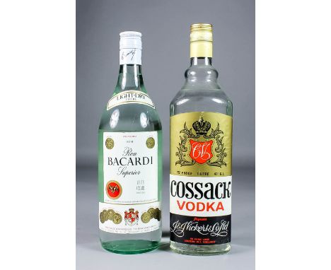 Four one litre bottles of Bacardi Light Rum (40% proof), and eight other bottles of Vodka (various distillers and bottle size
