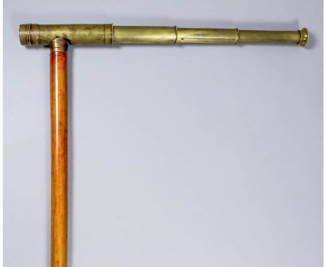 A 19th Century novelty walking stick, the cane shaft mounted with brass three draw telescope by W. Gregory & Co., 51 Strand, 