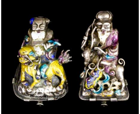 Two Chinese silver and enamel brooches, one depicting an immortal in purple enamel robe holding a deer, 40mm x 25mm overall, 