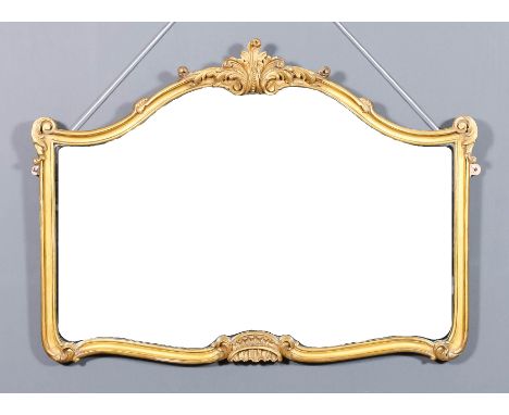 A 19th Century gilt framed rectangular wall mirror with arched top, the shaped and moulded frame with leaf scroll cresting, 2