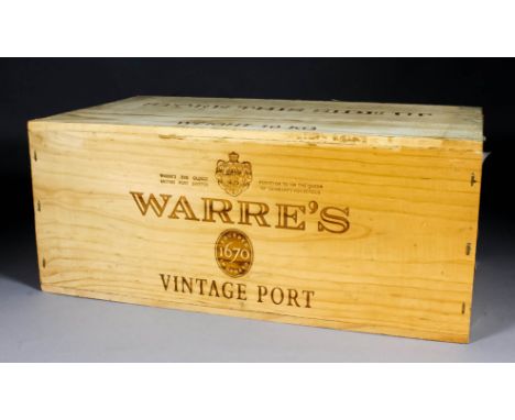 Twelve bottles of 1994 Warre's Vintage Port (contained in two sealed six bottle wooden cases)