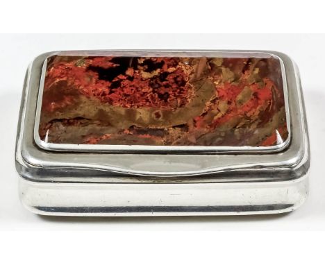 A George III silver rectangular snuff box, the lid inset with red and moss agate panel with in-curved sides, 2.5ins x 1.75ins