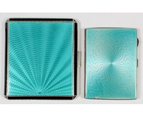 A George V silver and green guilloche enamel rectangular cigarette case with black enamel borders to front and engine turned 