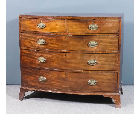 A George III mahogany bow front chest with square edge to top, fitted two short and three long drawers, on splayed bracket fe