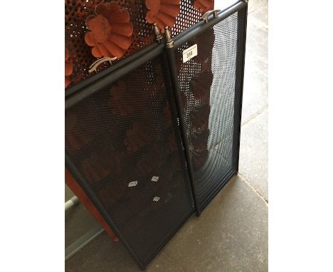 Folding fire screen. 