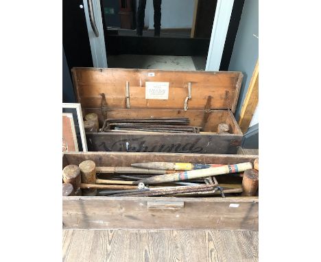 Two cased vintage croquet sets 