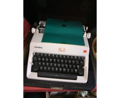 An Olympia SM9 typewriter and case 