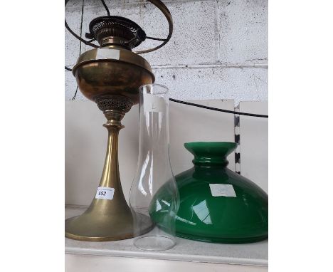 Edwardian brass oil lamp with green glass shade and funnel 