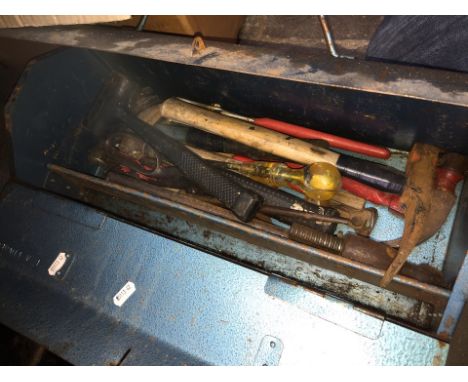 A metal toolbox with tools 
