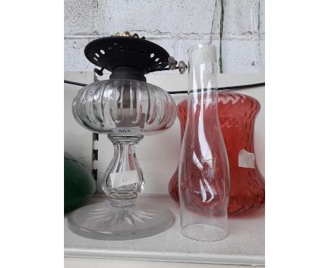 Victorian panel glass oil lamp with red shade and funnel 