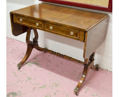 SOFA TABLE, Regency style mahogany and yewood crossbanded with drop flap top above two drawers, 73cm H x 95cm W x 58cm D, 155