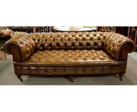 CHESTERFIELD SOFA, Victorian mahogany, hand finished tan brown leather upholstered with button curved upholstered back arm an