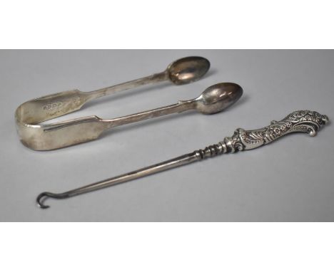 A Victorian Silver Sugar Bow and a Silver Handled Button Hook 