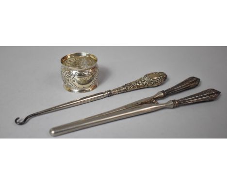 A Silver Napkin Ring, Silver Handled Glove Stretcher and Silver Handled Button Hook 