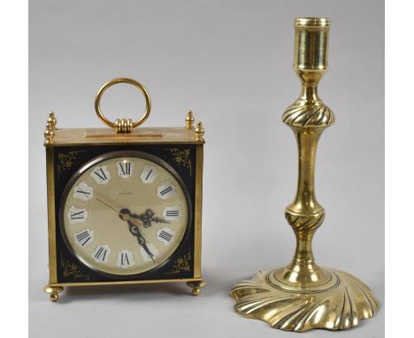 A Late Victorian Brass Candlestick, 22cm high Together with a Modern Brass Cased Carriage Clock with Battery Movement 