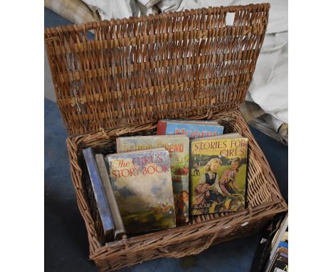 A Wicker Hamper Containing Children's Annuals 