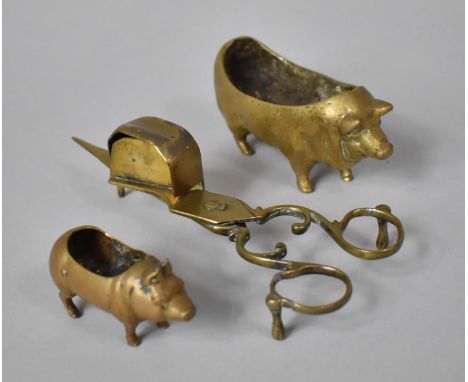 Two Late 19th Century Brass Novelty Pin Cushion Bases in the Form of Pigs, The Largest 11cm Long Together with a Brass Candle