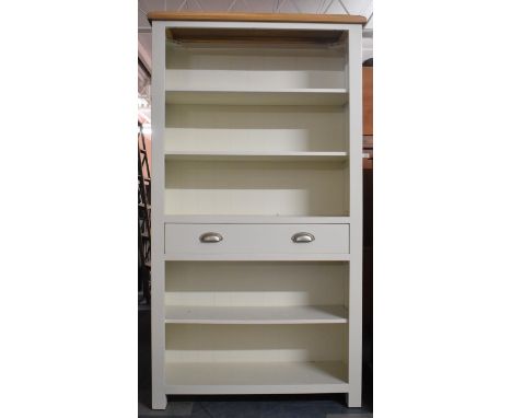 A Modern White Painted Four Shelf Bookcase with Centre Drawer, 100cm wide 