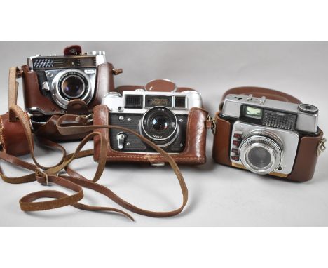 A Collection of Three Vintage Leather Cased 35mm Cameras 