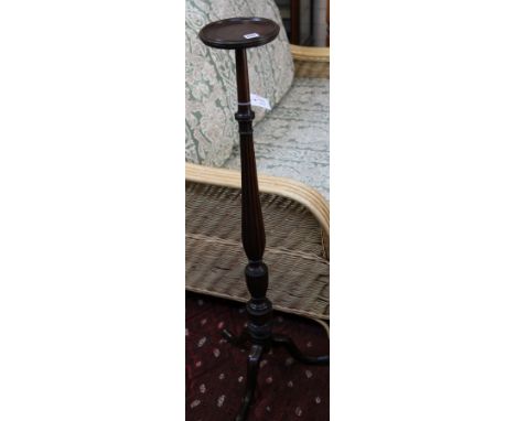 A late 18th century mahogany reeded slender baluster tripod torchere, H.112cm