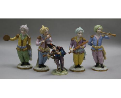 A Sitzendorf porcelain Turkish four-piece band and a 19th century Continental Commedia dell'Arte figure, modelled wearing a f