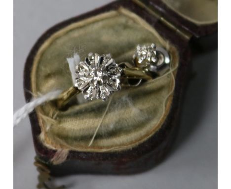 An 18ct gold and diamond cluster ring and a pair of 18ct white gold and diamond ear studs.