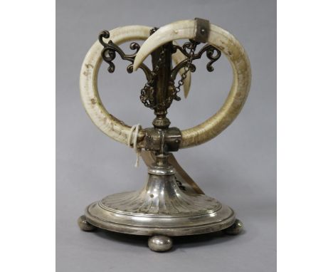 A plated tusk candlestick