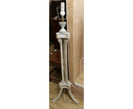 A cream and gilt painted lamp standard H.124cm