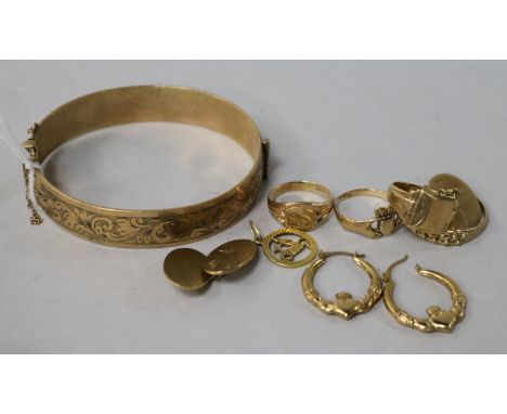 Four 9ct gold rings, a pair of cufflinks, a charm, a pair of earrings and a rolled gold bangle.