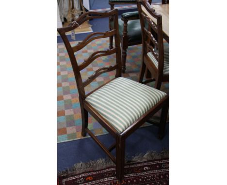 A set of six Chippendale style mahogany ladder-back dining chairs
