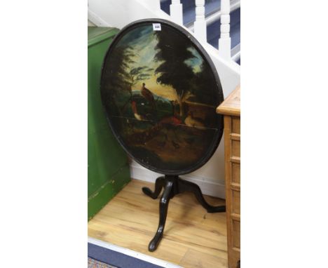 A painted tripod table, W.83cm