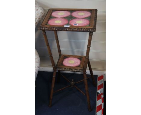 A Victorian carved mahogany tile top table, h.76CM