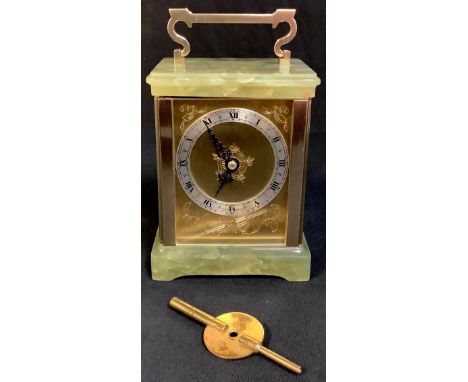 An Elliott onyx and gilt brass carriage clock, silvered chapter ring, Roman numerals, with key, 20cm over handle, 12cm wide 