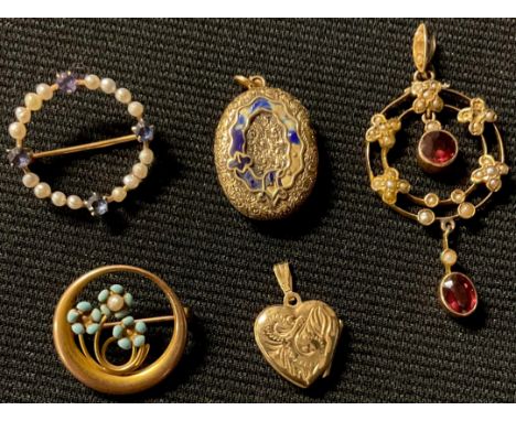 An Art Nouveau 9ct gold garnet and seed pearl pendant;  a turquoise and seed pearl brooch;  a Victorian mourning locket;  a b