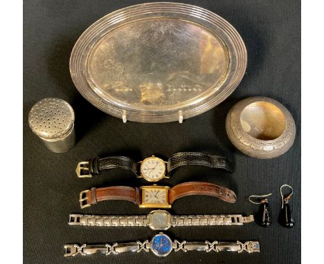 A Chinese silver coloured metal dish, engraved with fretted roundels and a border of lotus lappets, apparently unmarked, c.19