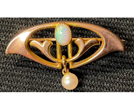 A late 19th/early 20th century 9ct rose gold openwork brooch, set with a central polished opal cabochon, suspended with a cul