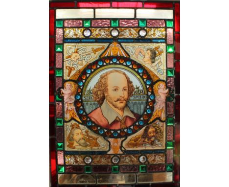 A coloured and painted glass panel, the centre as a portrait of William Shakespeare, 64.5cm x 51cm, mounted in a door, 202.5c