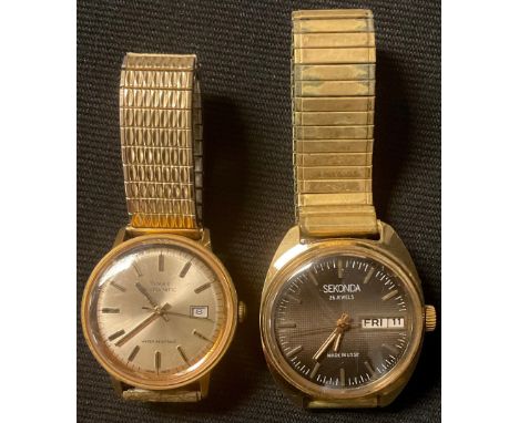 A Sekonda day/date wristwatch; another, Timex 