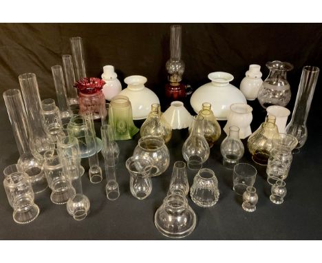 A Victorian etched cranberry glass light shade; others, 19th century and later, including uranium glass, milk glass, etc; a V