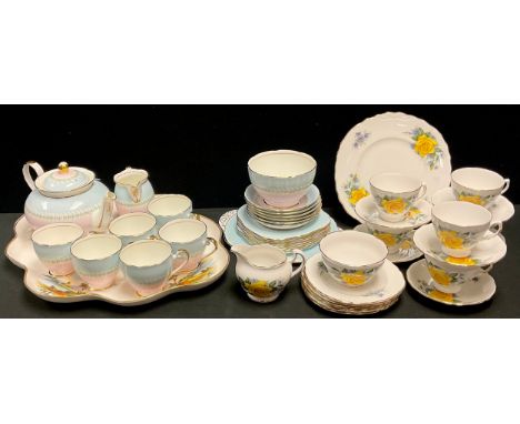 A Tuscan shaped oval cabaret tray, decorated with landscapes, gilt line borders;  a Sadler tea service;  a Crown Royal tea se