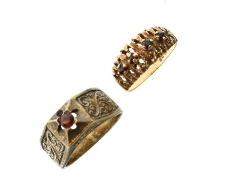 9ct gold dress ring set four garnet coloured stones and one other dress ring set garnet coloured stone   Condition: 