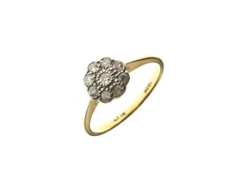 Diamond set daisy cluster ring, the shank stamped 18ct and Plat, size O   Condition: 