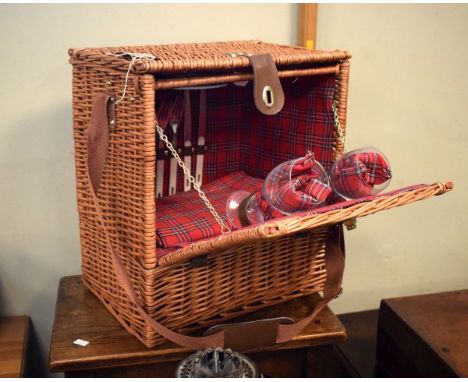 Late 20th Century two person wicker picnic hamper/set having tartan lining and accessories   Condition: 