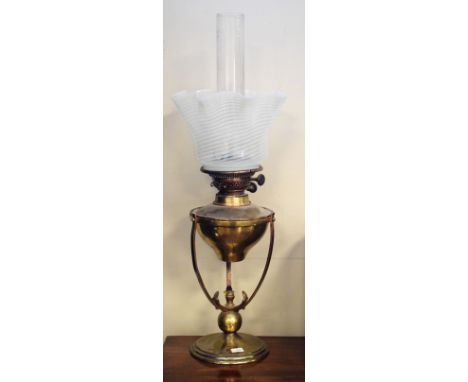 Late 19th/early 20th Century brass oil lamp in the manner of W.A.S. Benson, the vaseline glass shade having a ruffled rim   C