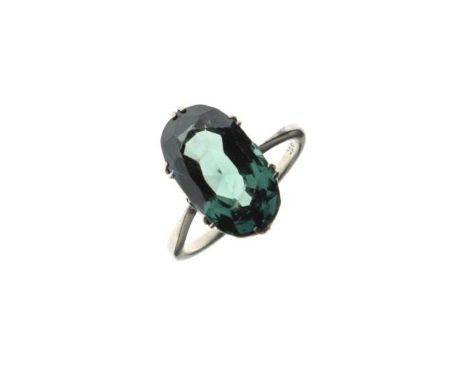 White metal dress ring set oval green coloured stone, the shank stamped 18ct, size L   Condition: 