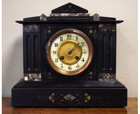 Late 19th/early 20th Century French black slate and marble cased architectural style mantel clock, the brass dial having off-